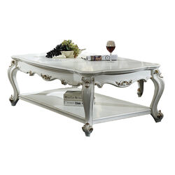 Traditional Style Wooden Coffee Table with Polyresin Carvings and Bottom Shelf, White
